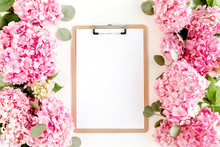 Clipboard Decorated Of Pink Hydrangea Flowers On White Background. Floral Concept. Flat Lay, Top View. 
