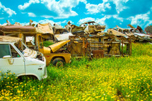 Pile Of Discarded Old Cars On Junkyard