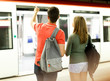 © JackF - Man with his girlfriend are standing on platform and choosing route
