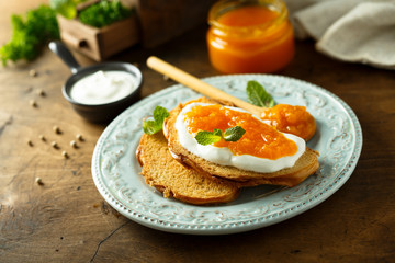 Wall Mural - Toasts with cream cheese and citrus jam