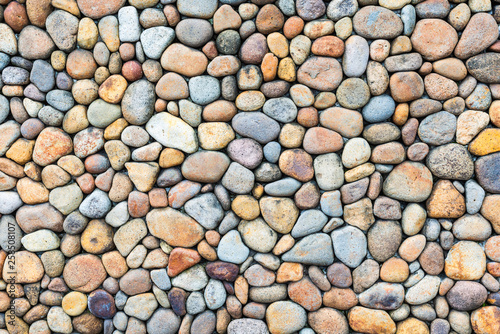 Fotomural Colorful pebble stone wall texture