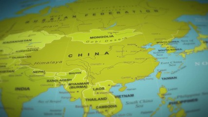 Wall Mural - World Map Flight Over Background/ 4k animation of a world map travel background flight over with ocean, countries and cities names