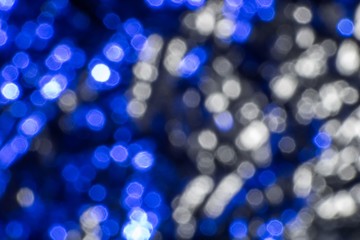 Wall Mural - Abstract blue and white bokeh light blurred background