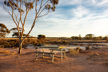 Picnic Area With A Bench And A Table Near A Dry Salt Lake In A Western Australia Outback