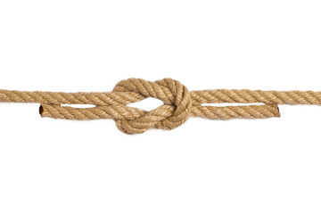 Wall Mural - Rope isolated. Macro of figure cross node or knot from two brown ropes isolated on a white background. Navy and angler knot.