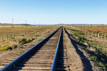 Trans-Mongolian railway, single-track railway in the Mongolian steppe, Mongolia