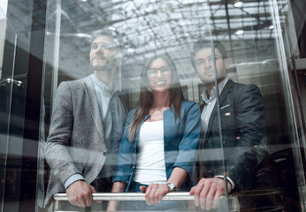 Canvas Print - Business team group going on elevator.