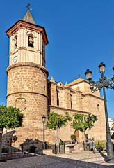 Wall Mural - Church and tower in the quaint village of Huecijar, Almeria, Spain.