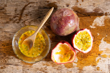 Ripe Passion Fruit And Passion Fruit Juice On Wooden Background