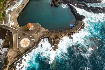 Fototapete - Aerial view of pier near Seixal village, Madeira island, Portugal. Summer travel background.