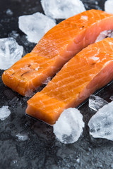 Wall Mural - Fresh salmon fillets on ice