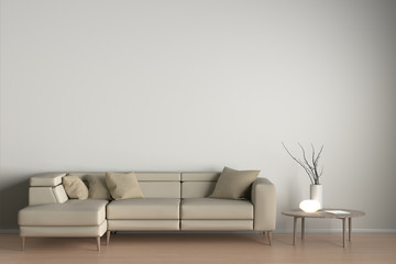 Interior of living room with beige leather sofa, white lamp and branches in vase on wooden coffee table