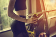 © Take Production - young fitness woman tired in gym drink   protein shake.exercising concept.fitness and healthy lifestyle