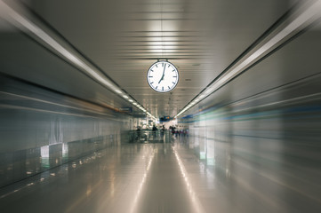 Blurred people at the train station.