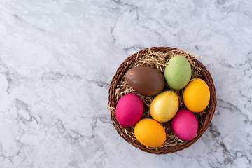 Traditional painted eggs for Holy Easter. Holiday greeting card concept. Marble background, top view