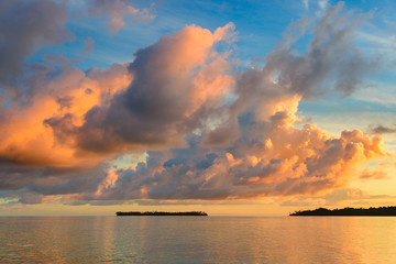 Sunriset dramatic sky on sea, tropical desert beach, no people, stormy clouds, travel destination, Indonesia Banyak Islands Sumatra