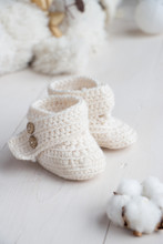 Newborn Baby Booties, Beige, Cozy And Nice. Child Clothe And Boots - Knitted And Sweet. Text Space, Copy Past And Place For Your Design