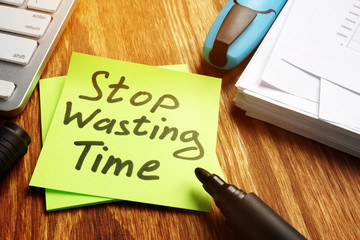 Stop wasting Time notice on a piece of paper.