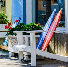 Adirondack Chairs On The Sidewalk