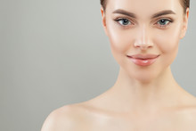 Young Woman Face Closeup. Beautiful Model Girl With Healthy Skin. Facial Treatment And Skincare Concept