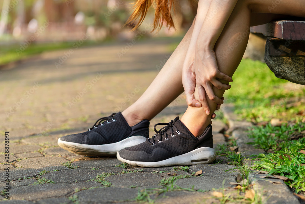 Running injury leg accident. Close up, sport woman runner touching ...