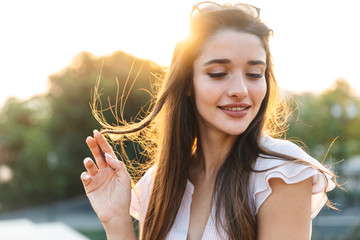 Poster - Beautiful lovely young woman with long brunette hair