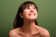 Happy beautiful girl. Joyful facial expression. Closeup portrait of emotional brunette lady with bare shoulders.