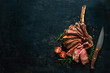 Grilled dry aged tomahawk steak sliced as close-up