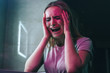 © estradaanton - Fight with drug addition. Drug addict holds hands on her hand and is going crazy near drugs. Drug addicted woman with smeared makeup screaming in night club's toilet. Drug kill you. Drug obsession and