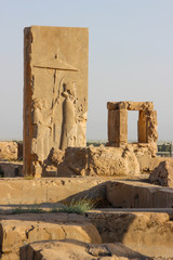 Wall Mural - Persepolis, Iran - May 15, 2017: Walls of the ancient capital of Persia. Persepolis is the capital of the Achaemenid kingdom. sight of Iran. Ancient Persia. Bas-relief on the walls of old buildings.