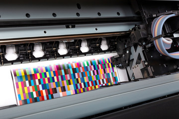 Poster - Printer ink jet print machine printing color patches for color management control