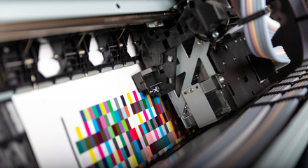 Poster - Printer ink jet print machine printing color patches for color management control