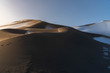 © napsterio - Dunhuang ,  China :  The Silk road - Mingsha sand mountain (Gobi desert) with snow covered in the early winter
