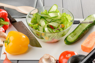 Wall Mural - Cooking a vegetable salad