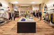 © Westend61 - Interior of a modern concept store, displaying fashion