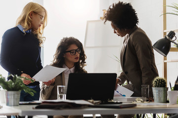 Wall Mural - Group of businesswomen discussing new project