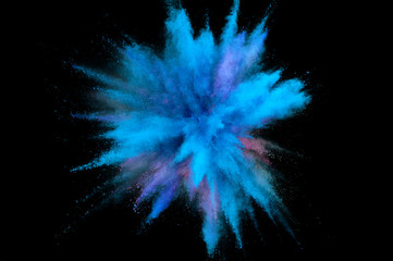 Wall Mural - Colored powder explosion. Abstract closeup dust on backdrop. Colorful explode. Paint holi