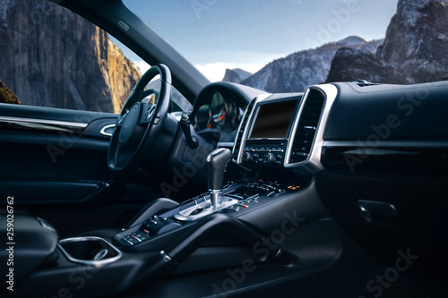 Cuadros en Lienzo Expensive car interior with stearing wheel, multimedia and gearbox handle