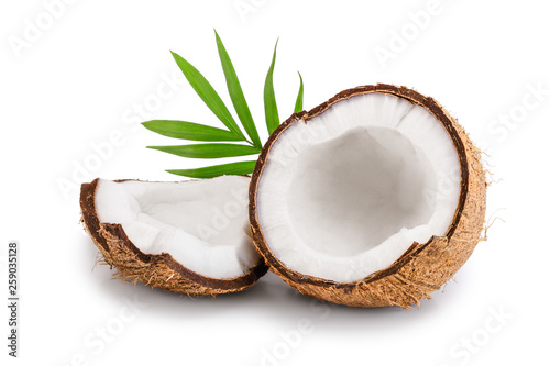 Fotomural half of coconut with leaves isolated on white background