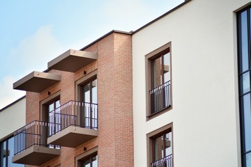 Fragment of a modern apartment building in front. Very modern apartment house.