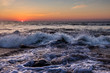 Ocean waves at sunrise in Ocean City, MD. Looking out over the Atlantic Ocean. Photo by: Chuck Beyer