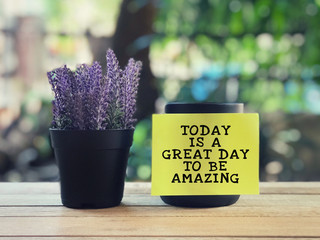 Wall Mural - Motivational and inspirational quote - Today Is A Great Day To Be Amazing written on a yellow sticky paper. Blurred styled background.