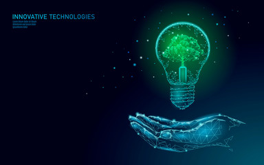hand holding light bulb lamp saving energy ecology concept. polygonal light blue sprout small plant 