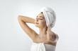 © Buyanskyy Production - Beautiful young woman after bath on white background
