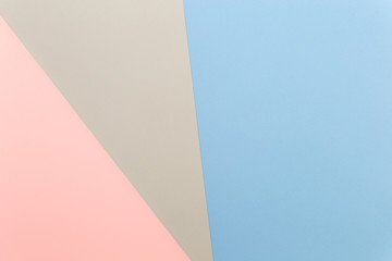 Poster - Multicolor background from cardboard of different colors. Pastel paper color for background. Colorful abstract geometric shapes. Pastel colored paper texture minimalism background. Pink, Blue, Grey.