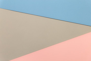 Poster - Multicolor background from cardboard of different colors. Pastel paper color for background. Colorful abstract geometric shapes. Pastel colored paper texture minimalism background. Pink, Blue, Grey.