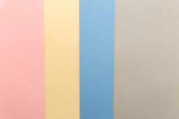 Poster - Multicolor background from cardboard of different colors. Pastel paper color for background. Colorful abstract geometric shapes. Pastel colored paper texture minimalism background. Pink, Blue, Grey.