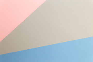 Poster - Multicolor background from cardboard of different colors. Pastel paper color for background. Colorful abstract geometric shapes. Pastel colored paper texture minimalism background. Pink, Blue, Grey.
