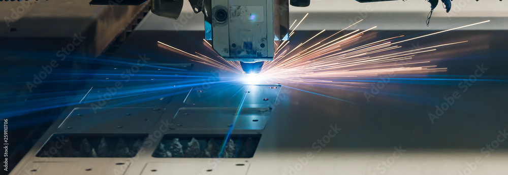 Industrial Laser cutting processing manufacture technology of flat sheet metal steel material with sparks - obrazy, fototapety, plakaty 