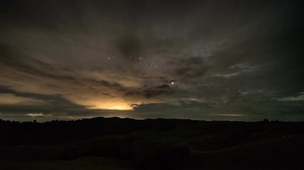 Wall Mural - clouds moving fast in starry night stars milky way sky in summer evening in new zealand astronomy ti